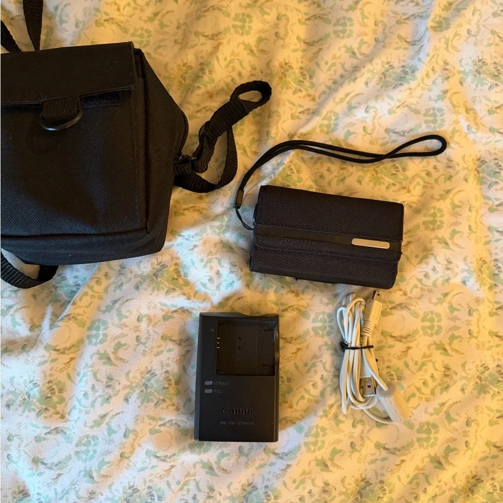 Canon Red Digital Camera with Black Accessories